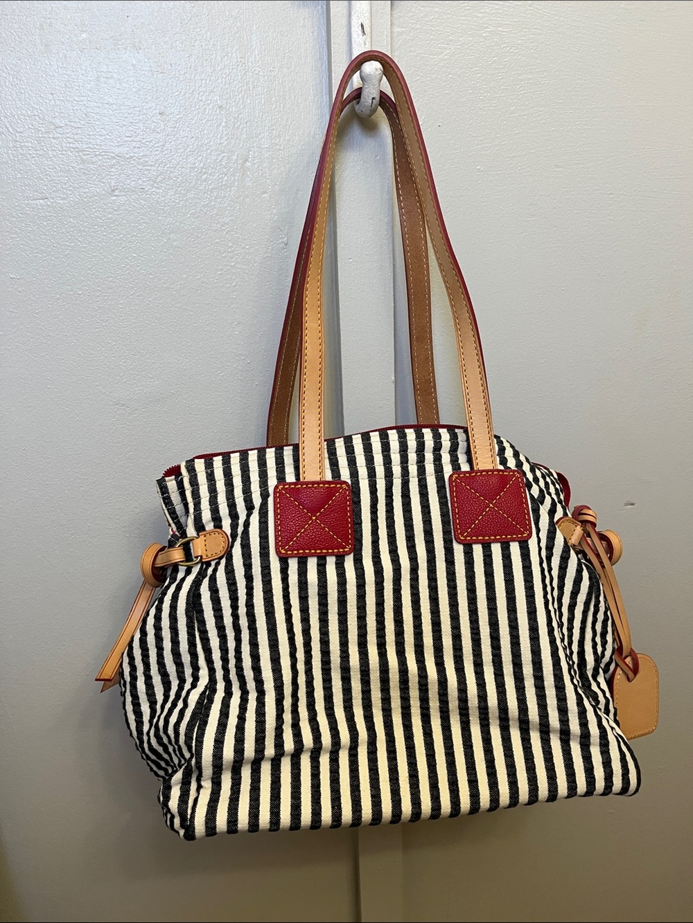 Dooney and Bourke authentic striped purse with pink interior SEE DESCRITPTION !